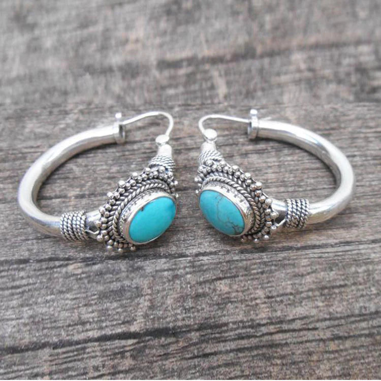 Pendientes retro elegantes de turquesa