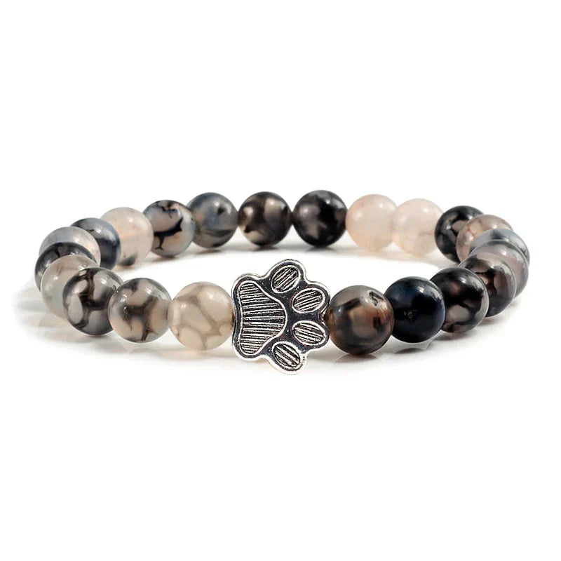 Pulsera con huellas de patas decoradas