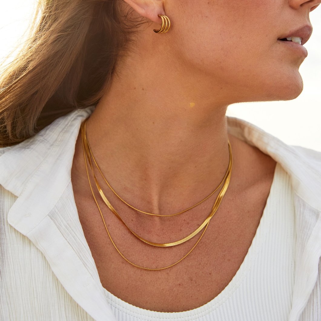 Collar de cadena multicapa de oro