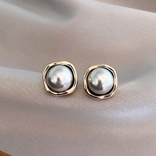 Pendientes elegantes con perla negra 